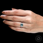 Side view of hexagon moissanite ring on stone prop