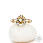 Old mine cut pear light champagne moissanite split shank engagement ring in yellow gold