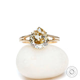 Old mine cut pear light champagne moissanite split shank engagement ring in yellow gold