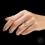 Minimalist pear champagne moissanite split shank solitaire ring in polished yellow gold