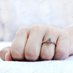 Grey moissanite solitaire ring prong setting detail