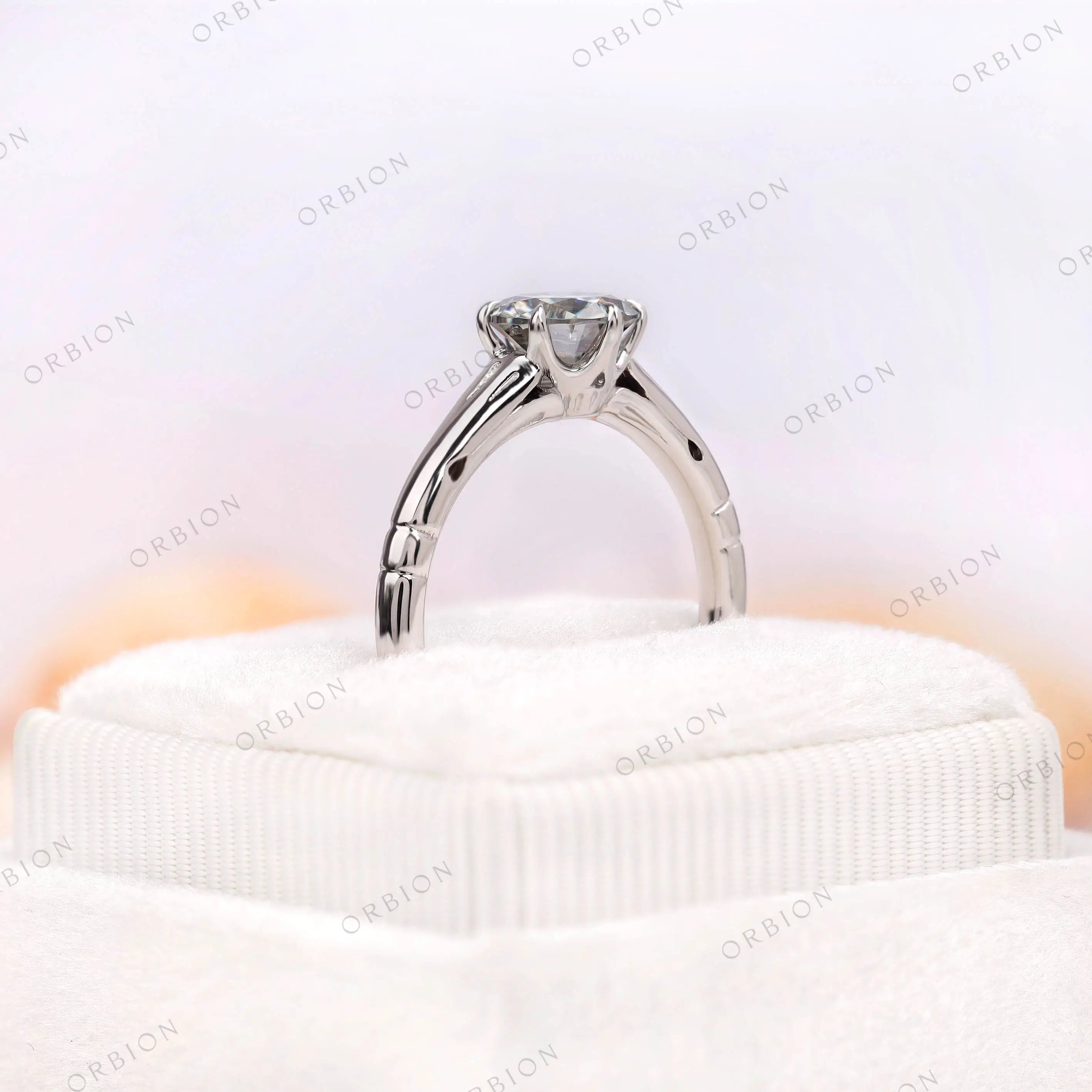 Round grey moissanite solitaire ring in white gold front view