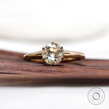 Round Old European cut moissanite solitaire ring in yellow gold top view