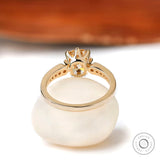 The back view of the Elongated Cushion Moissanite Engagement Ring with round brilliant side stones, showing the detailed gallery.