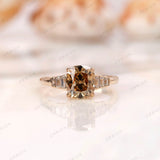 Dark champagne elongated cushion moissanite ring with baguette side stones front view