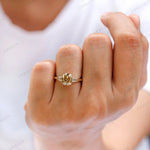 Front centered view of old mine cut cushion moissanite ring