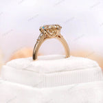 Ring box display of antique champagne moissanite pear ring"