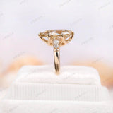 Detailed close-up of antique champagne moissanite ring from side angle