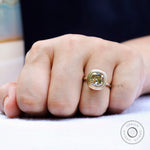 Minimalist yellow gold bezel set moissanite engagement ring
