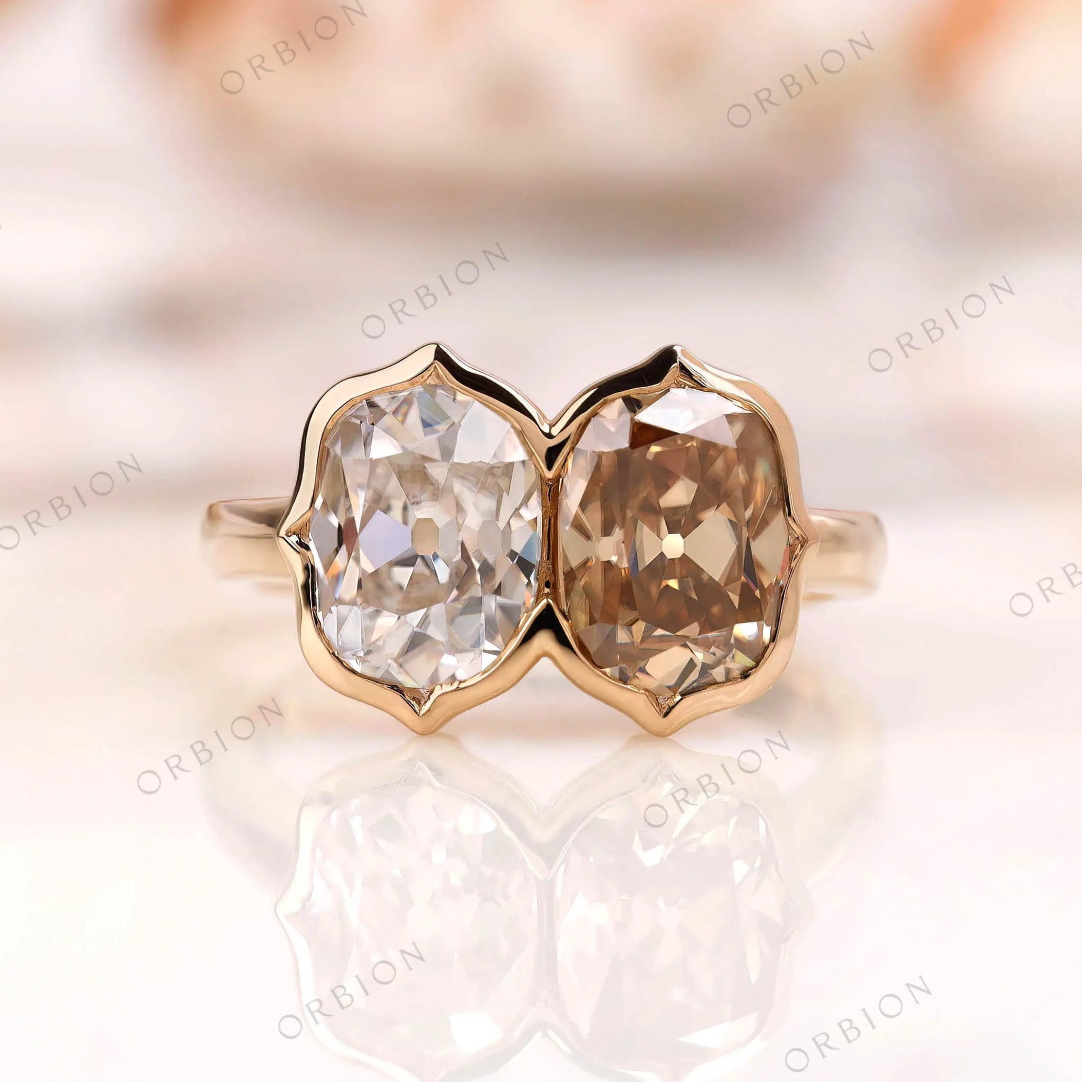 Dual elongated cushion Old Mine Cut moissanite bezel set Toi et Moi ring in yellow gold front view