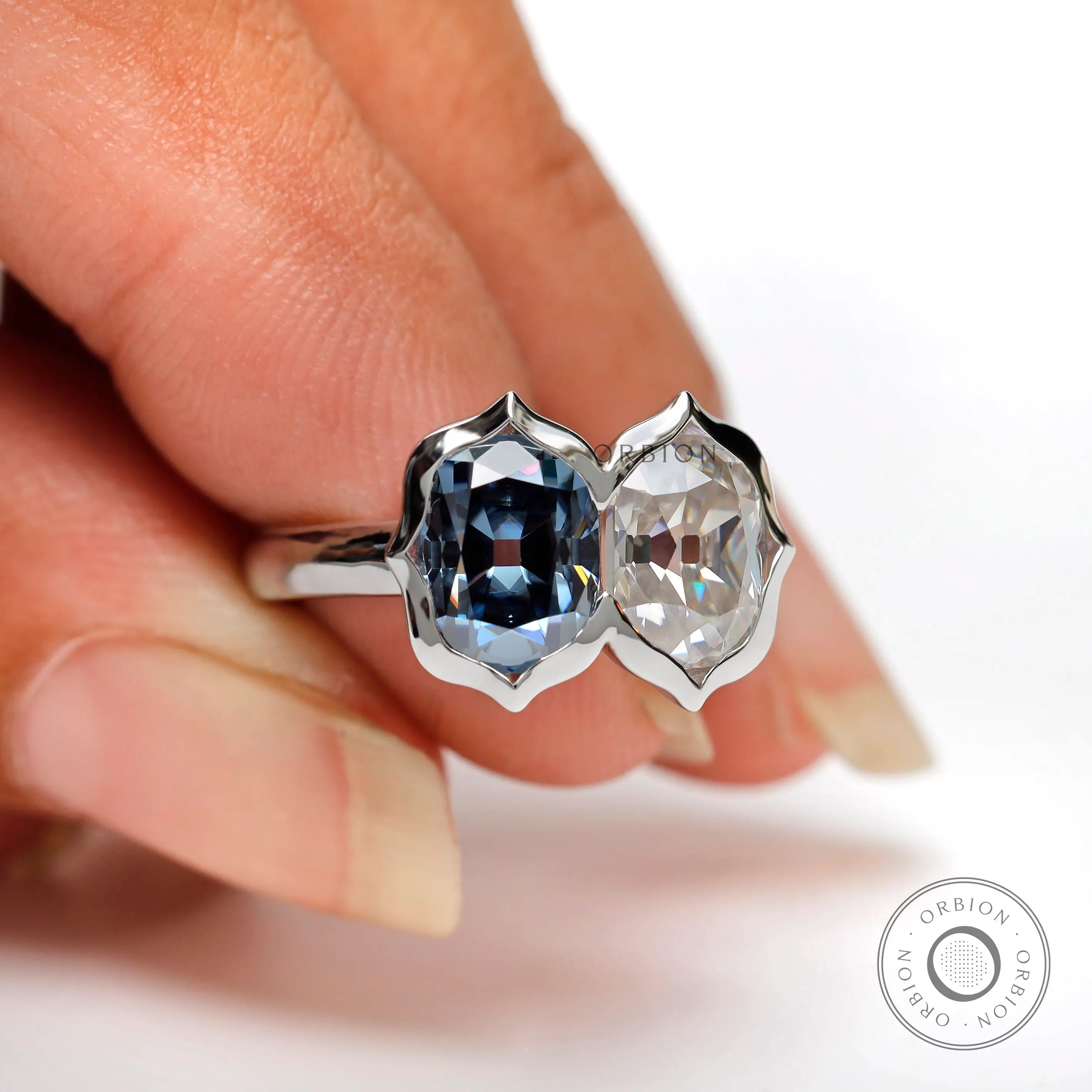 Deep blue and colorless moissanite double stone ring