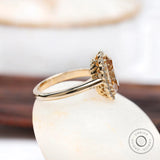 Oval Old Mine Cut Dark Champagne Moissanite Halo Ring in 10K Yellow Gold
