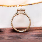 Cathedral engagement ring with bubble diamond band