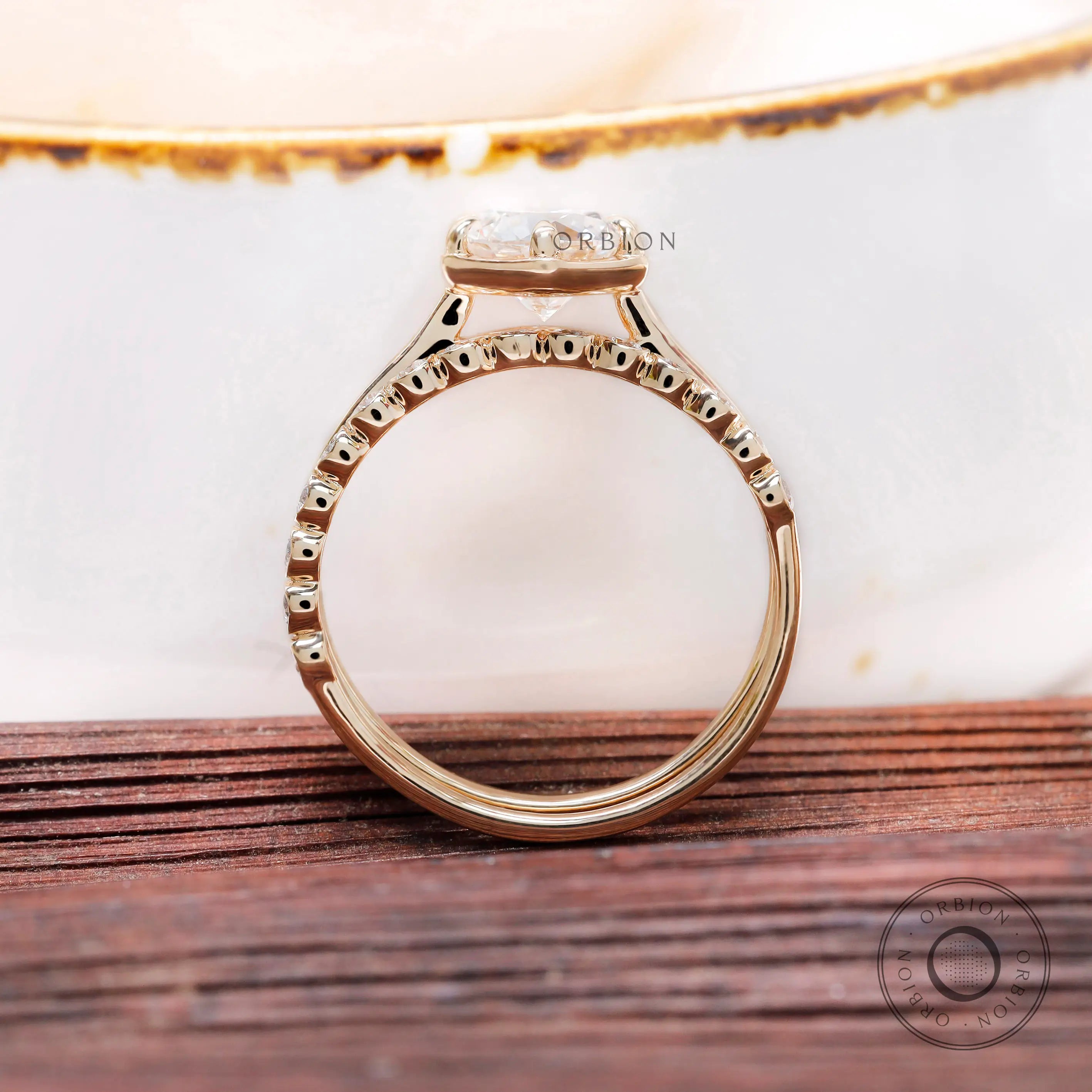 Cathedral engagement ring with bubble diamond band