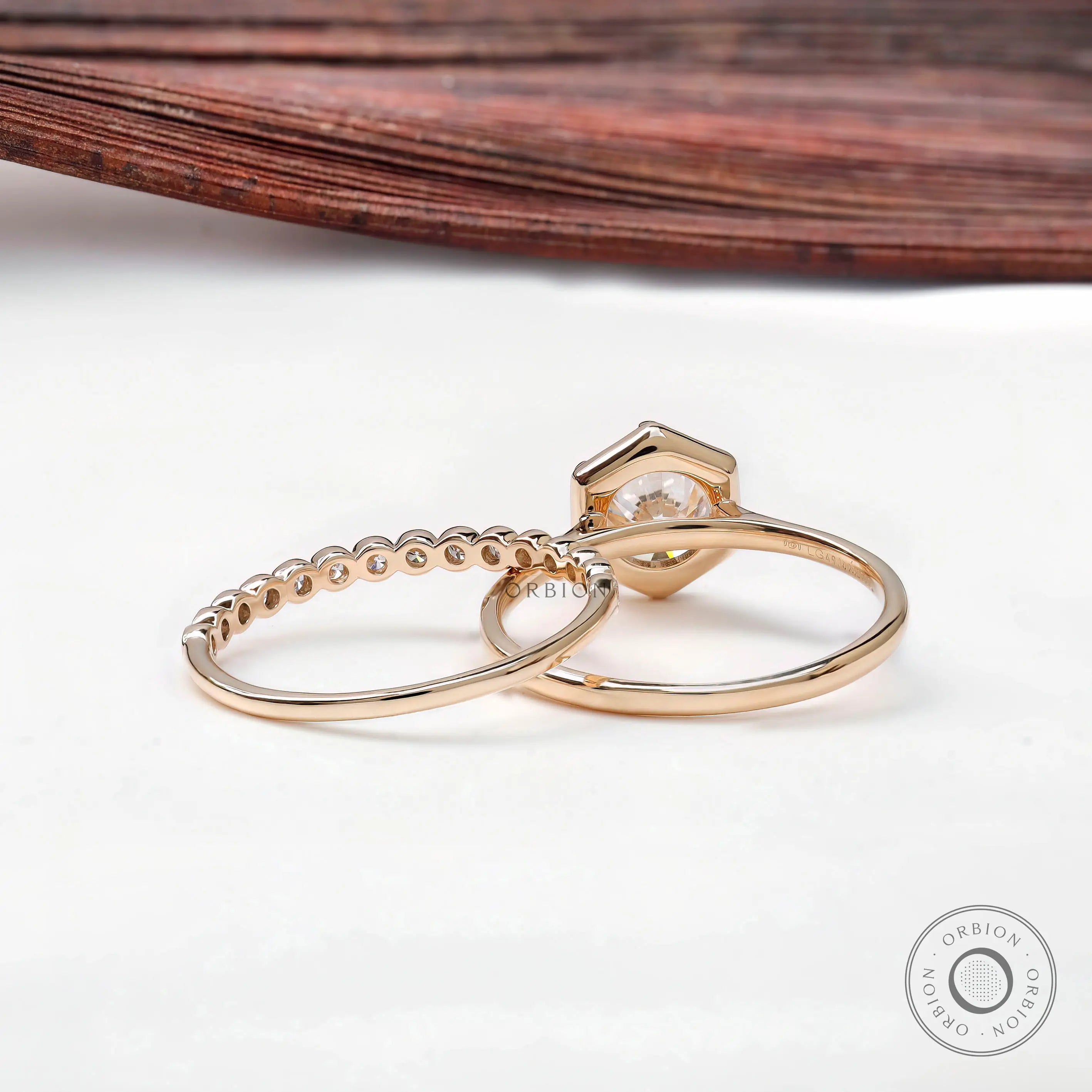 Cathedral style round lab grown diamond engagement ring with matching bubble band