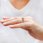 Hand worn solitaire signet moissanite ring side perspective