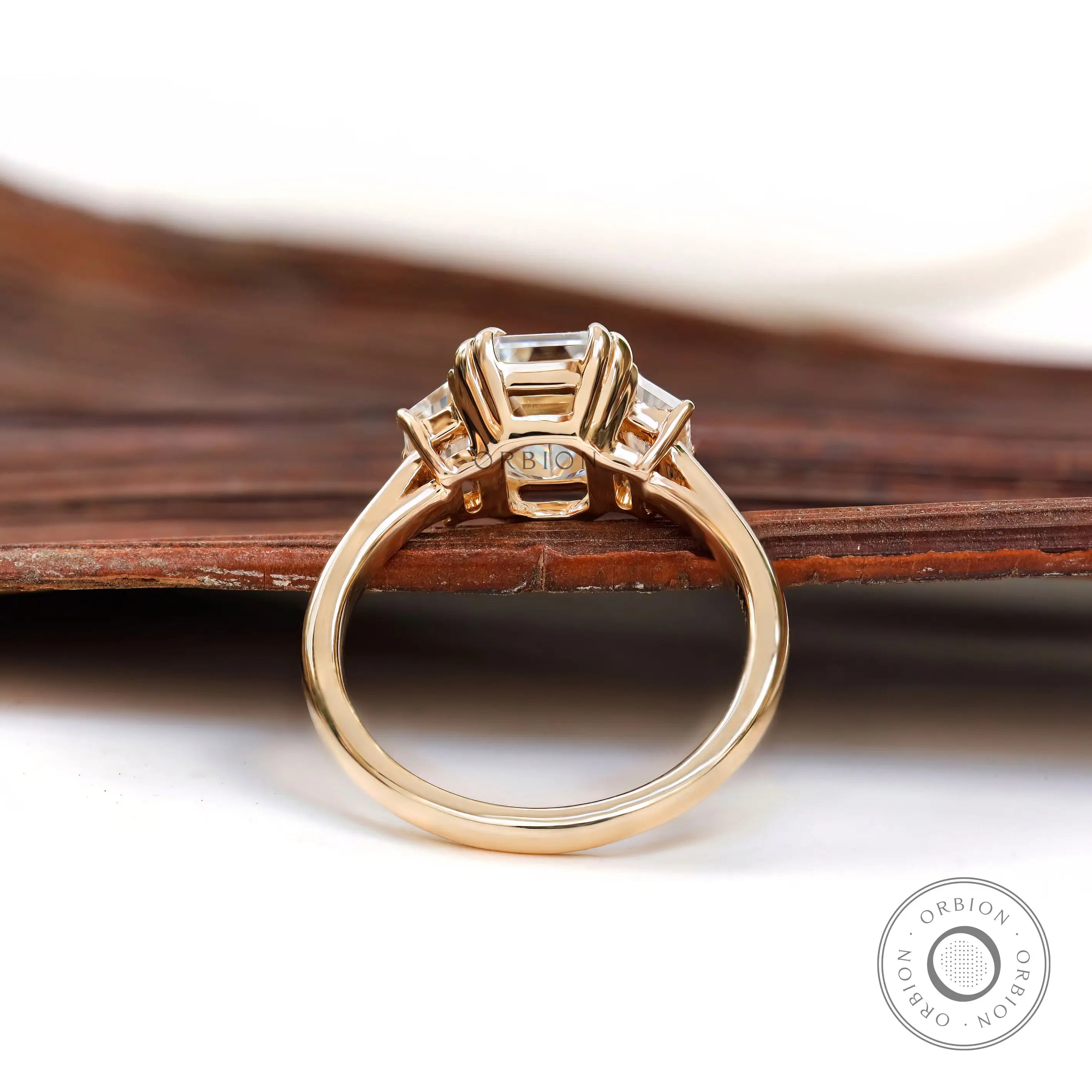 Basket and prong detail of emerald cut ring