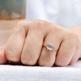Top view of emerald cut three stone engagement ring