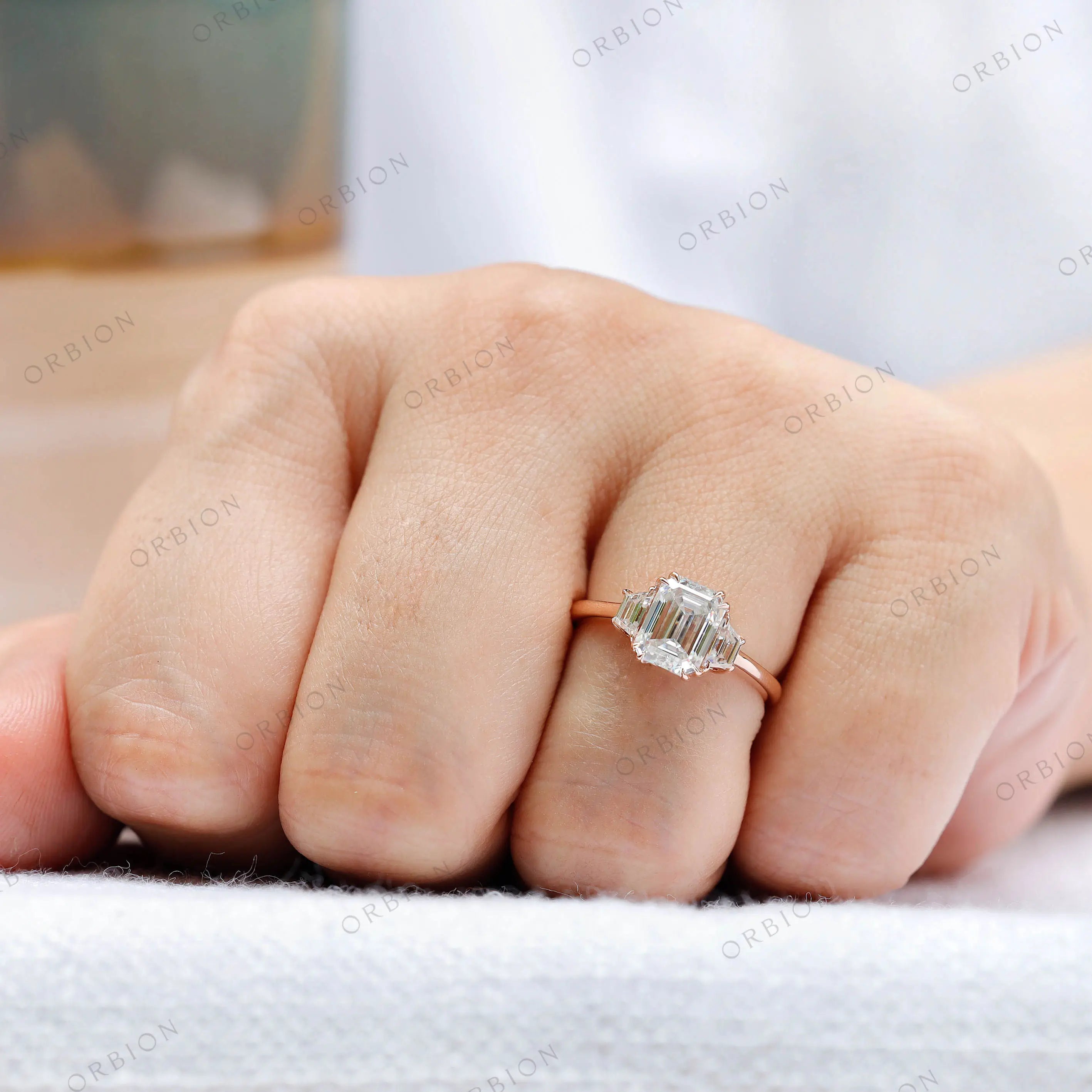 Top view of emerald cut three stone engagement ring