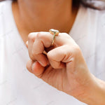 Side angle hand shot showing height and profile of ring