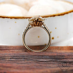 Pave band detail with round moissanite accents in gold