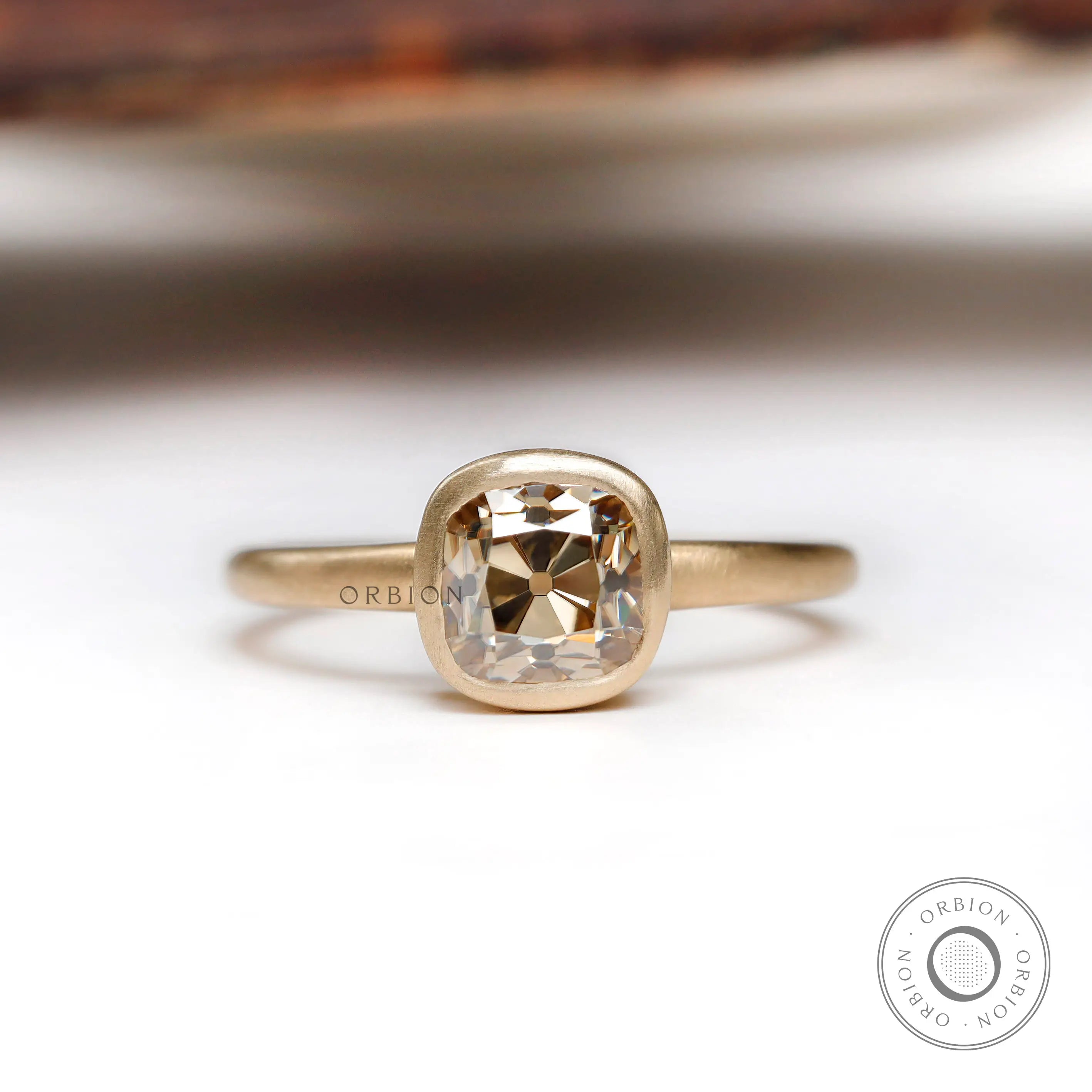 Elegant solitaire cushion cut dark champagne moissanite bezel set engagement ring