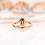 Back view of Moissanite Light Champagne Old Mine Cut bezel set solitaire ring in 10K yellow gold
