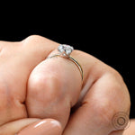 Cushion cut moissanite ring on hand minimalist design
