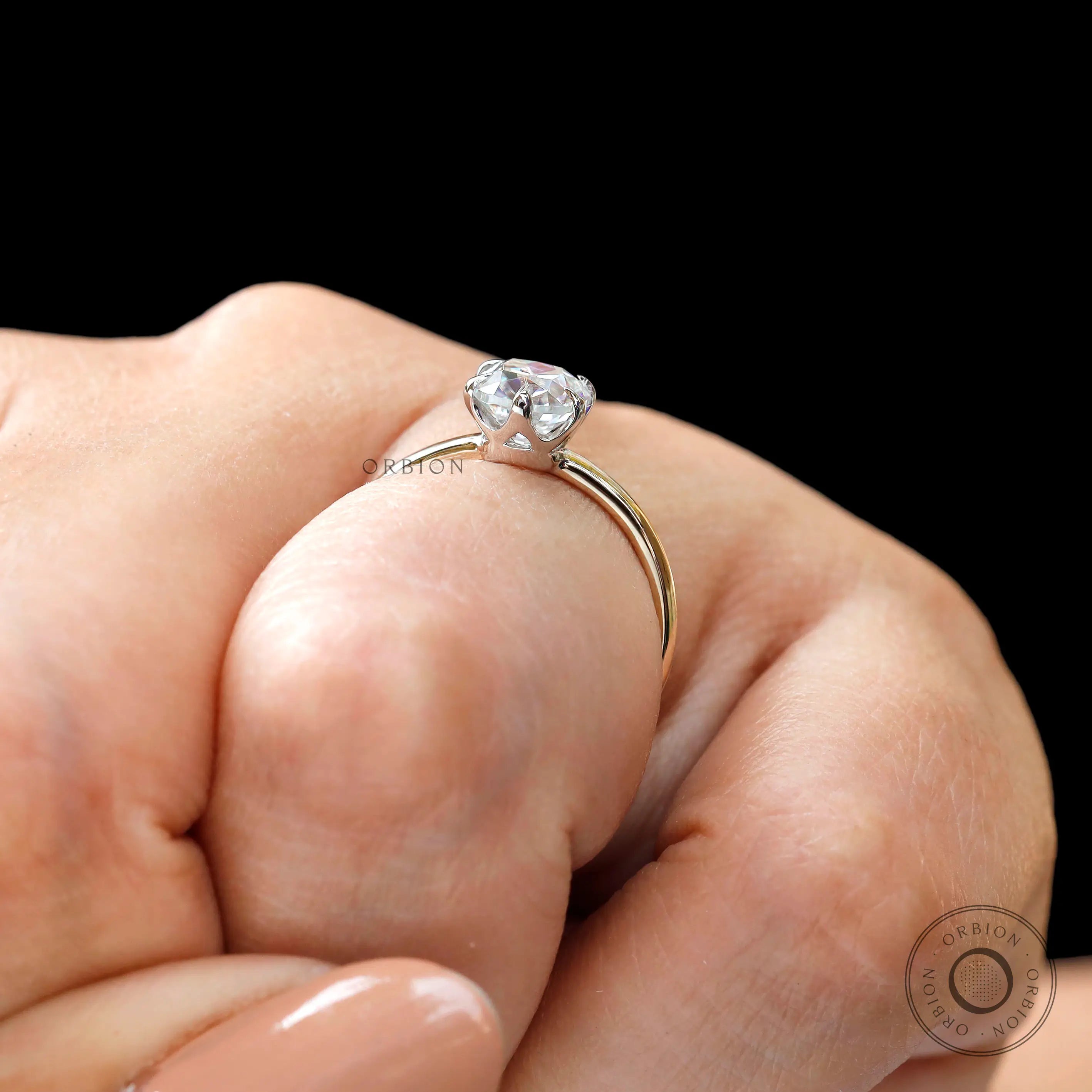 Cushion cut moissanite ring on hand minimalist design