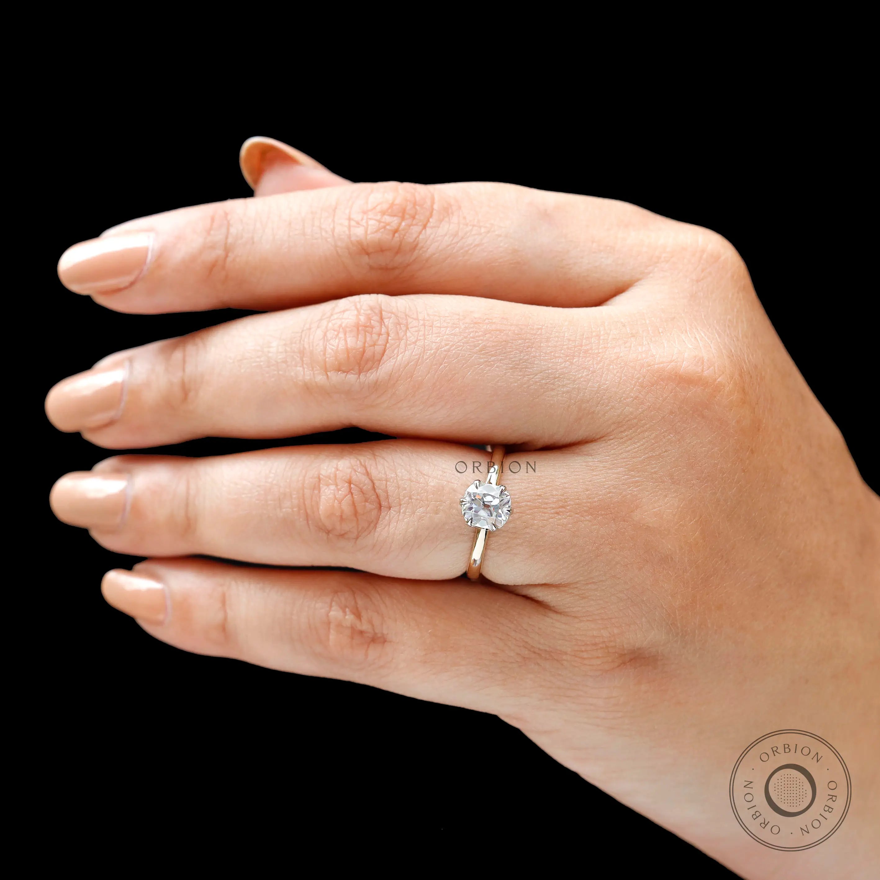 Elongated cushion moissanite ring close up view