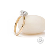 Classic solitaire engagement ring two tone gold