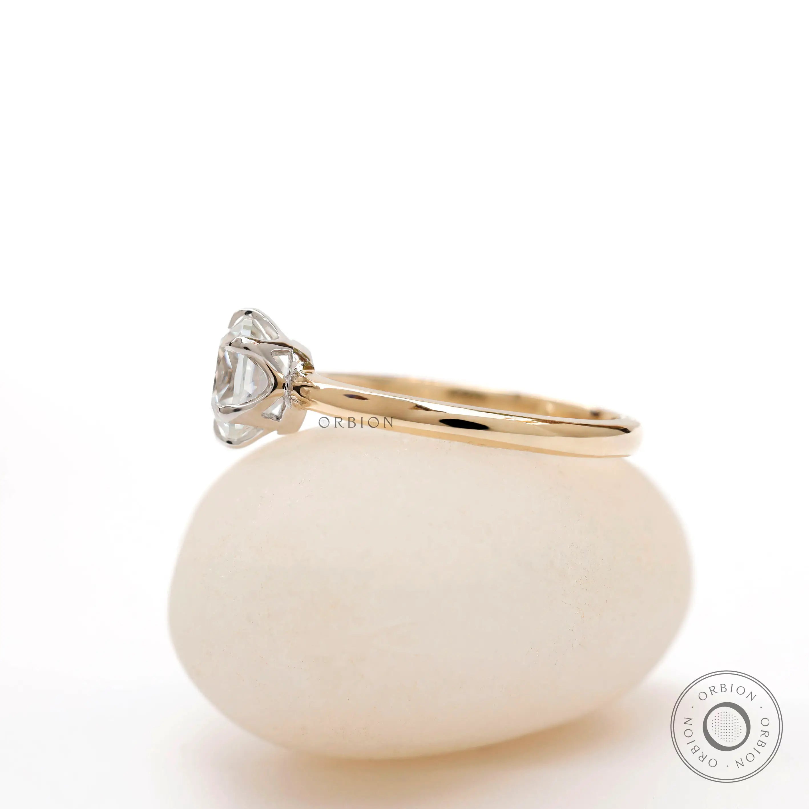 Two tone gold solitaire engagement ring side view