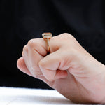Dark champagne moissanite trilogy statement ring with baguette diamonds