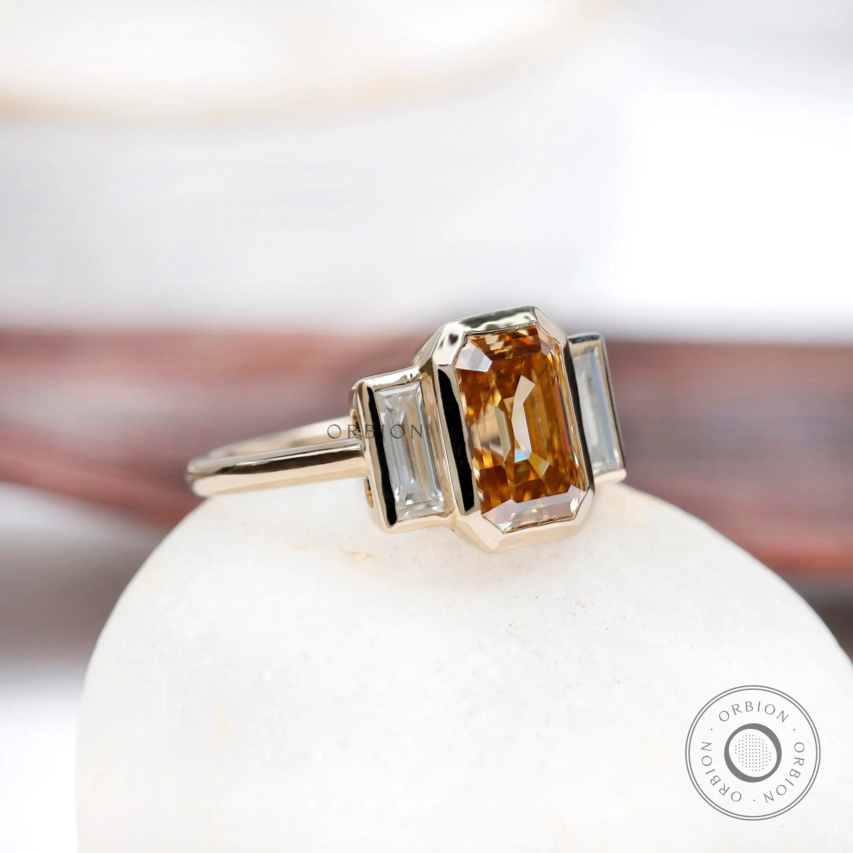2.8 carat old mine cut emerald moissanite ring with baguette side stones