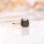 Dark green moissanite geometric ring in yellow gold bezel setting