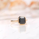 Dark green moissanite geometric ring in yellow gold bezel setting