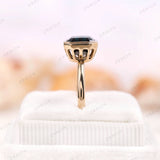 Side profile of Asscher cut moissanite ring in 10K yellow gold