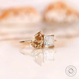 Pear champagne and princess cut moissanite two stone ring side view