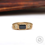 East west emerald cut green moissanite trilogy engagement ring in 14K yellow gold