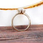 Close up pear moissanite engagement ring