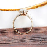 Close up pear moissanite engagement ring