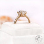 Detailed view of Moissanite stone in vintage pear engagement ring