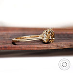 Side profile showing prong setting and stone height