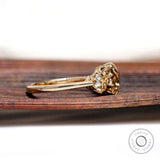 Side profile showing prong setting and stone height