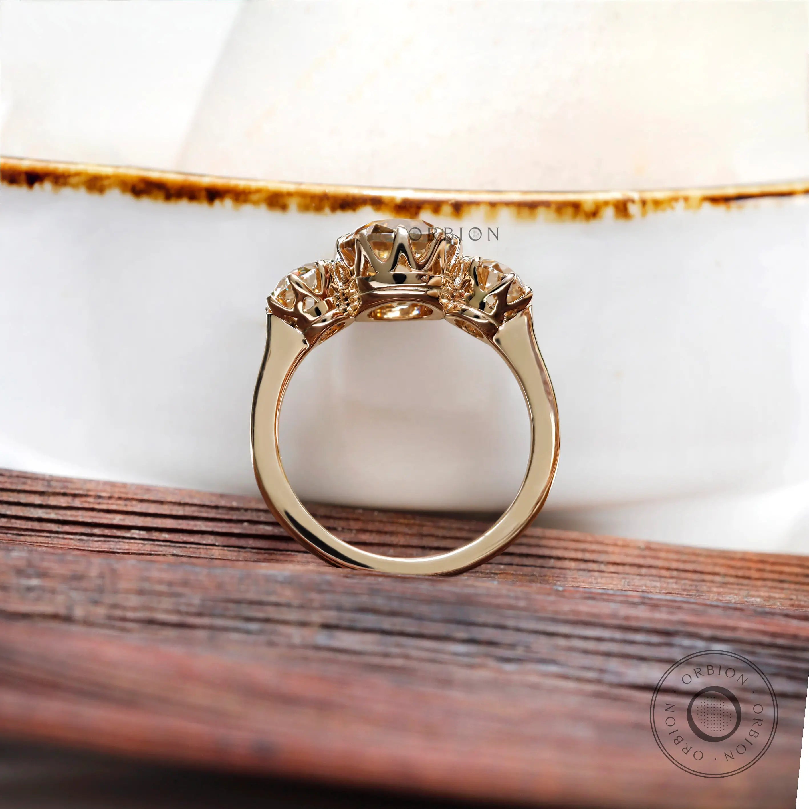 Classic trilogy moissanite ring with high polish finish
