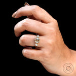 Vintage inspired three stone engagement ring in warm tones