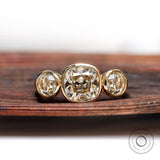 Three stone cushion moissanite ring in 10K yellow gold front view