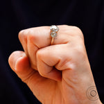 Side profile of three stone champagne moissanite ring