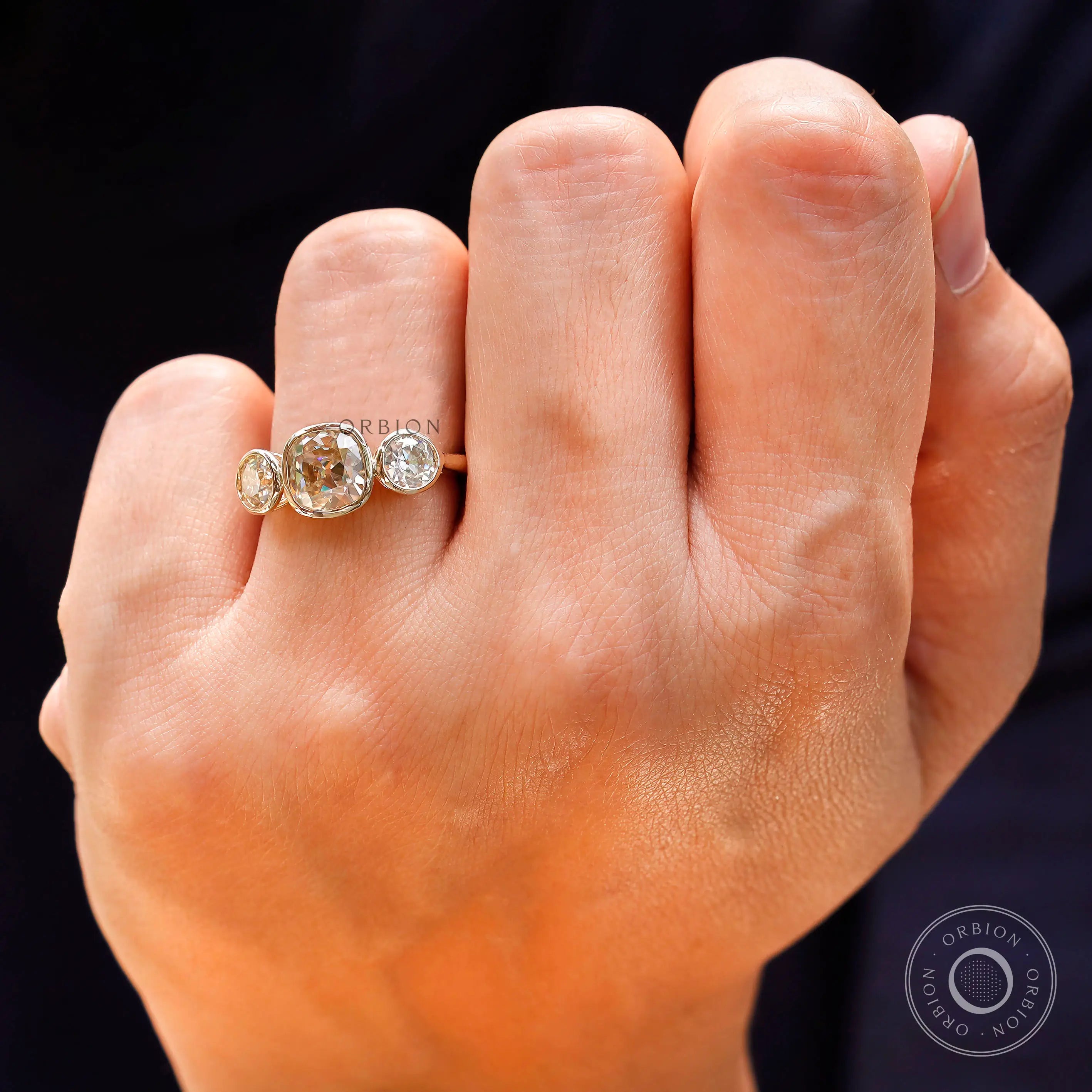 Light champagne moissanite engagement ring top view