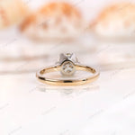 Back view of the Old European Cut Moissanite solitaire ring, emphasizing the detailed bezel setting in dual-tone 10K gold.